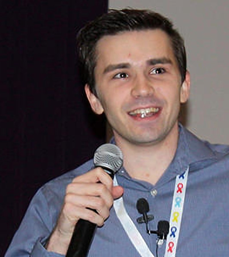 Tyler McNamer speaking on stage